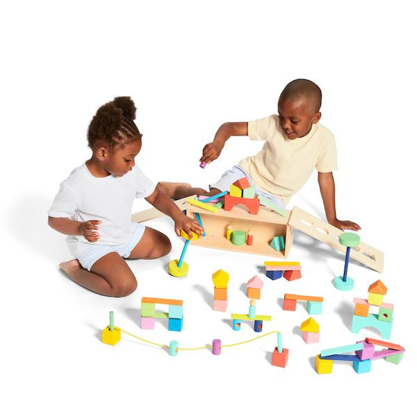 Two children are playing with toys - Loveverybaby
